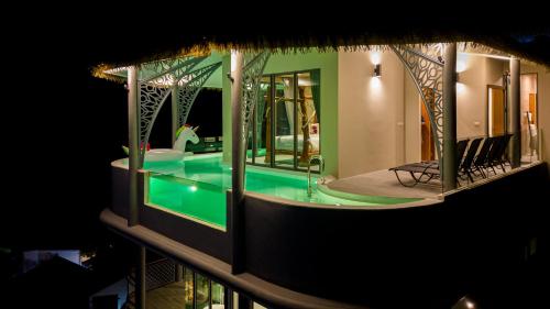 a view of a house with a swimming pool at Three Monkeys Villas in Patong Beach