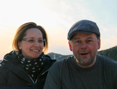 a man and a woman posing for a picture at Tustna Ladestasjon in Hals