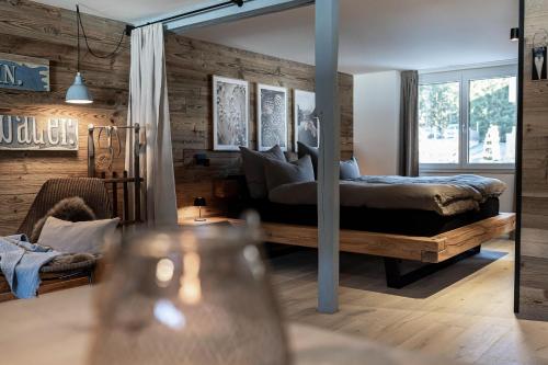 Postel nebo postele na pokoji v ubytování Loft am See
