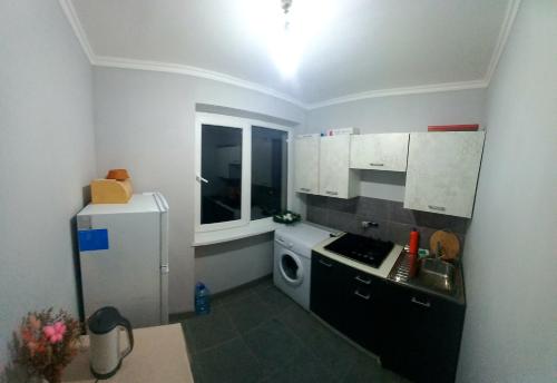 Dapur atau dapur kecil di Квартира в Новом Афоне с видом на море