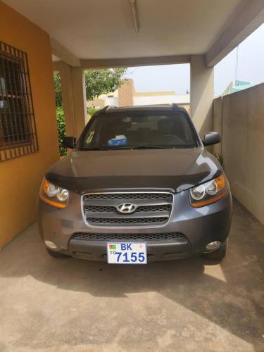 a silver car is parked in a garage at VILLA PHOEBE Cité BOAD Lomé Baguida in Lomé