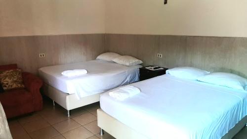 Ein Bett oder Betten in einem Zimmer der Unterkunft Casa Glamour