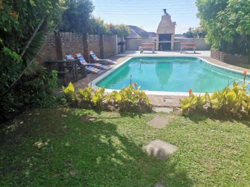 La pileta dentro o cerca de Palm Tree BnB