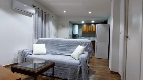A seating area at Acogedor Ático en Pleno Centro