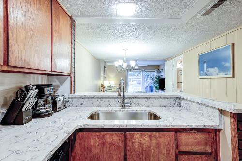 a kitchen with a sink and a counter top at Hilton Head Cabanas 14 in Hilton Head Island