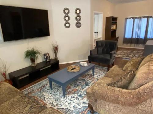 a living room with a couch and a table at The Lofts at Myrtle in El Paso
