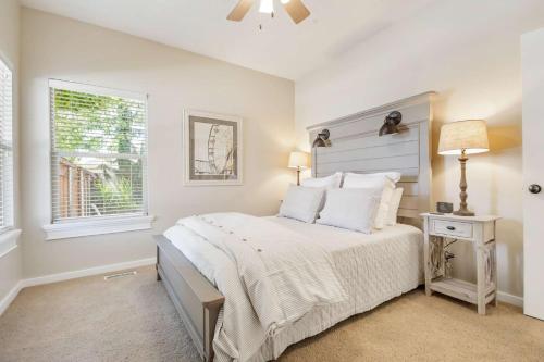 a bedroom with a large bed and a window at Redwick in Meridian