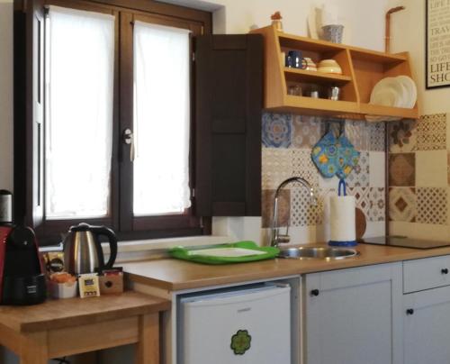 Kuchyň nebo kuchyňský kout v ubytování B&B Interno SG - Monolocale
