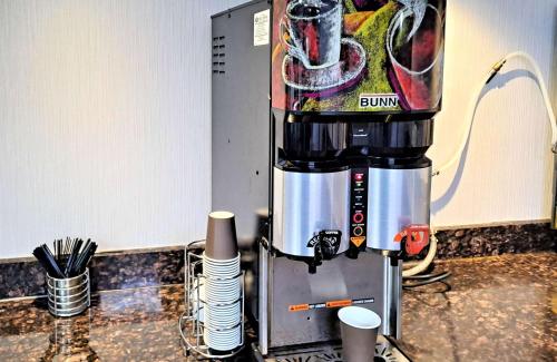 a coffee maker sitting on a counter in a kitchen at Motel 6 Catonsville MD Baltimore West in Catonsville