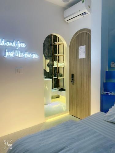 Postel nebo postele na pokoji v ubytování Y&Y hotel Ho Chi Minh City