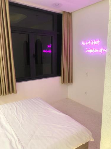 Postel nebo postele na pokoji v ubytování Y&Y hotel Ho Chi Minh City