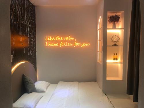 Postel nebo postele na pokoji v ubytování Y&Y hotel Ho Chi Minh City