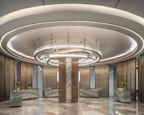 a rendering of a lobby with a large chandelier at Fili Hotel at Nustar Cebu in Cebu City