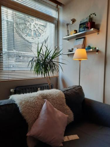 Een zitgedeelte bij St Catherine - Sweet home - Bxl - Studio Apartment with city view