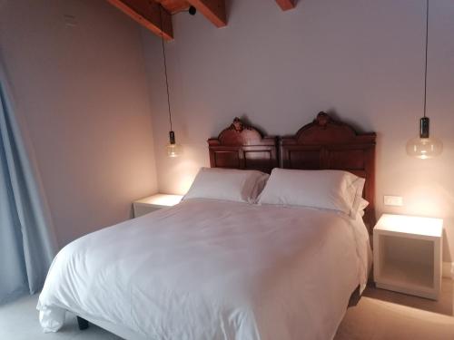 Ένα ή περισσότερα κρεβάτια σε δωμάτιο στο Agriturismo La Rondinella
