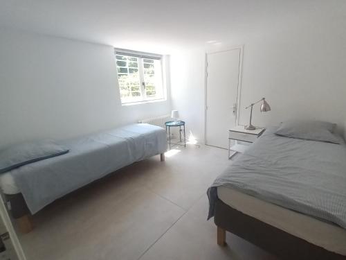 Posteľ alebo postele v izbe v ubytovaní Arcachon Jolie maison de vacances avec 4 chambres et grand jardin