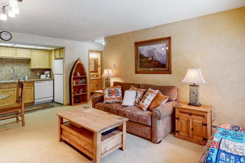 a living room with a couch and a table at Ten Mile Haus in Frisco