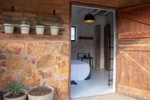 Katil atau katil-katil dalam bilik di Mount High Luxury Stables