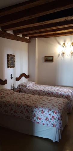 ヴェネツィアにあるCasanovaのベッドルーム1室(ベッド2台付)
