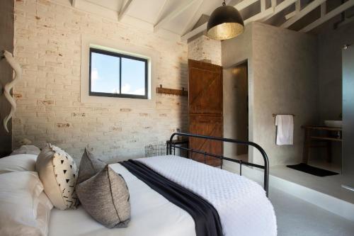 Katil atau katil-katil dalam bilik di Mount High Luxury Stables