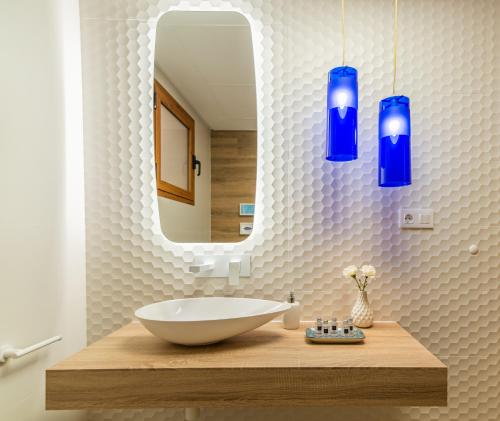 Ένα μπάνιο στο Renteando Albir Apartments