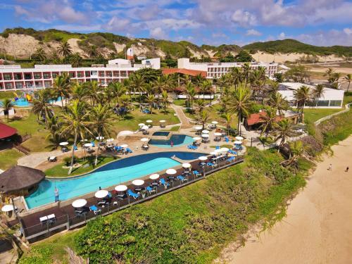 an aerial view of a resort with a swimming pool at El Aram Imirá Beach Resort in Natal