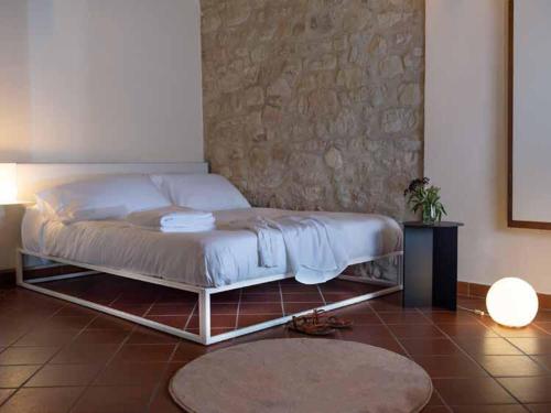 Кровать или кровати в номере Borgo BiancoMatilde - Boutique Hotel