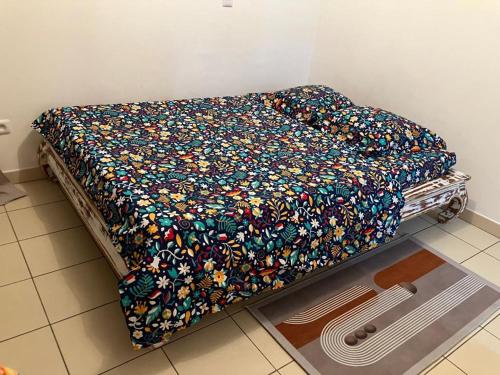 Cama ou camas em um quarto em GOUTALI