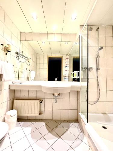 Mercure Hotel Plaza Magdeburgにあるバスルーム