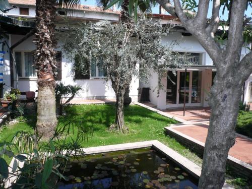 Vonkajšia záhrada v ubytovaní Oasi Holiday Home