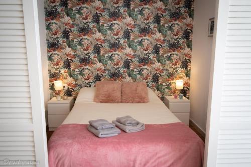 Giường trong phòng chung tại Estudio frente al mar