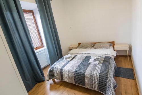 Postel nebo postele na pokoji v ubytování Hostel Vojnik