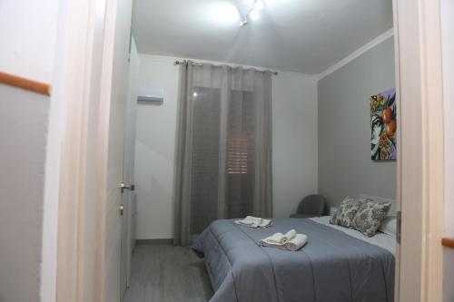 Ένα ή περισσότερα κρεβάτια σε δωμάτιο στο Camurría Sicily home