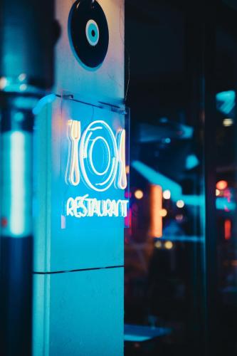 a sign on the side of a building with a camera at Suadhan Hotel in Istanbul