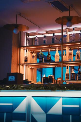 a bar with bottles of alcohol on the shelves at Suadhan Hotel in Istanbul