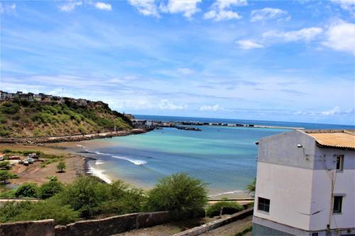 a view of a beach and the ocean at KAZARÃO DI MAVETE - Guesthouse in Praia