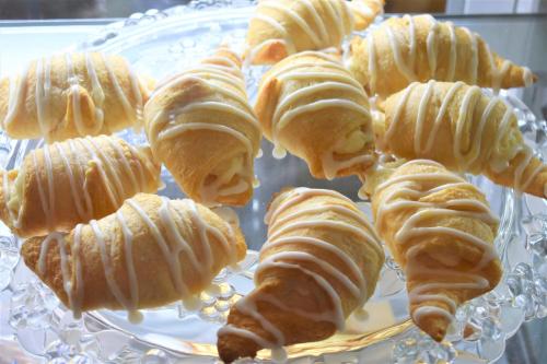 a plate of pastries with white icing on it at Arrowhead Country Cabins in Mount Carmel
