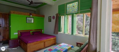 Postel nebo postele na pokoji v ubytování The Moon Light Home stay