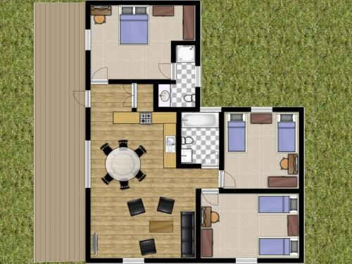 a floor plan of a house with a table at Rowan Lodge 3 Hot Tub in York