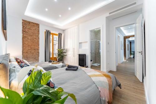 Postel nebo postele na pokoji v ubytování Exclusive Luxury Apartment in Central Madrid