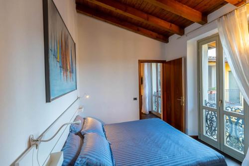 Ένα ή περισσότερα κρεβάτια σε δωμάτιο στο La casa di Fiò