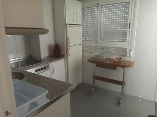 Kuchyň nebo kuchyňský kout v ubytování Apartamento Playmar Almeria