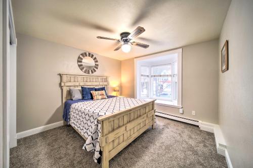 a bedroom with a bed and a ceiling fan at Charming Kellogg Home Near Outdoor Activities in Kellogg