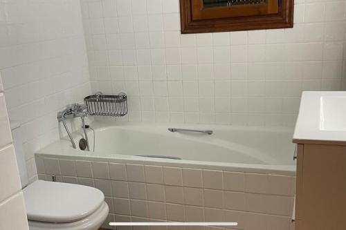A bathroom at Classical corner town house in historical centre