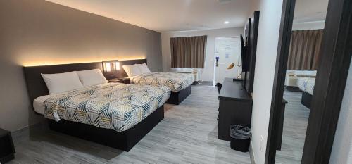 Ένα ή περισσότερα κρεβάτια σε δωμάτιο στο Motel 6 Aransas Pass TX
