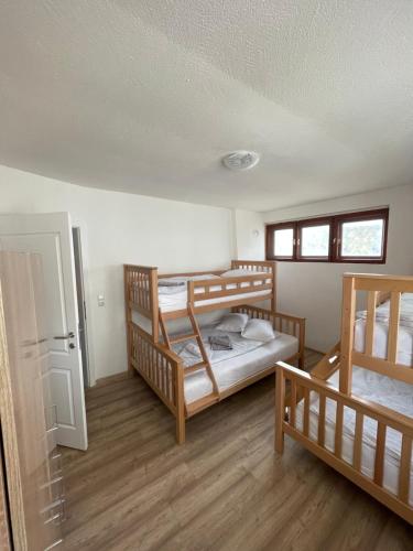 Postel nebo postele na pokoji v ubytování Planinski raj