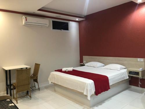 Foto da galeria de HOTEL E POUSADA ISIS em São Pedro