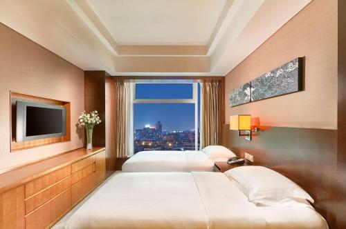 Cama o camas de una habitación en DoubleTree by Hilton Beijing