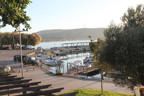 a marina with boats parked in the water at Athens Riviera coast apartment in Athens