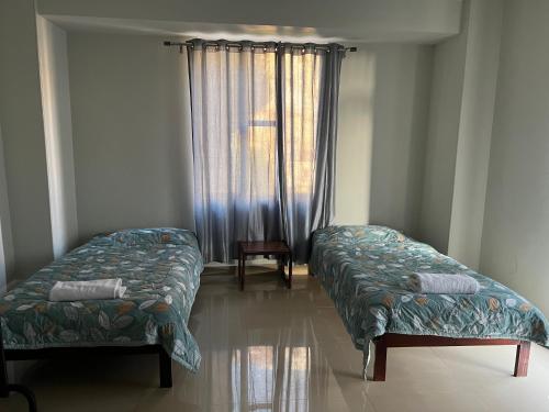 Cama o camas de una habitación en Hotel Dinthar Zara